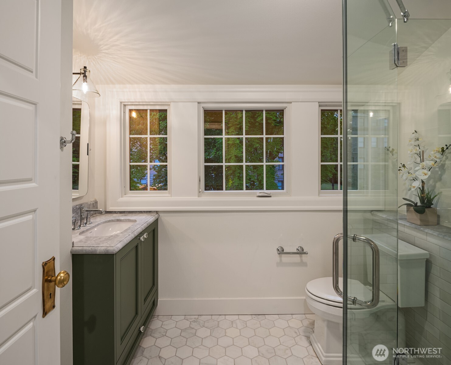740 22nd Avenue East Seattle, WA 98112 - Photo 28 of 40 a bathroom with a sink and toilet