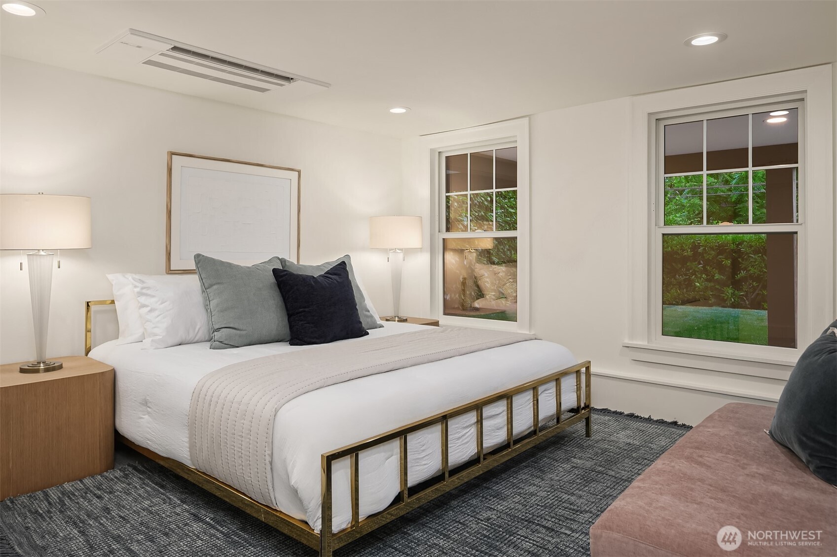 740 22nd Avenue East Seattle, WA 98112 - Photo 30 of 40 a bedroom with a bed and a window