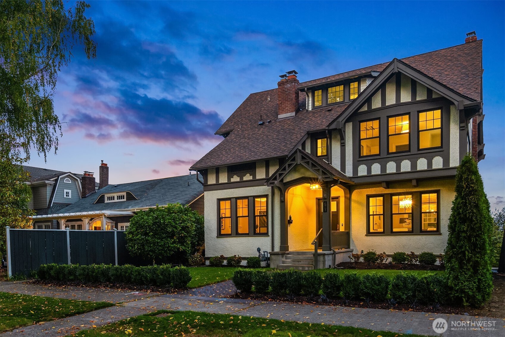740 22nd Avenue East Seattle, WA 98112 - Photo 40 of 40 a front view of a house with a yard