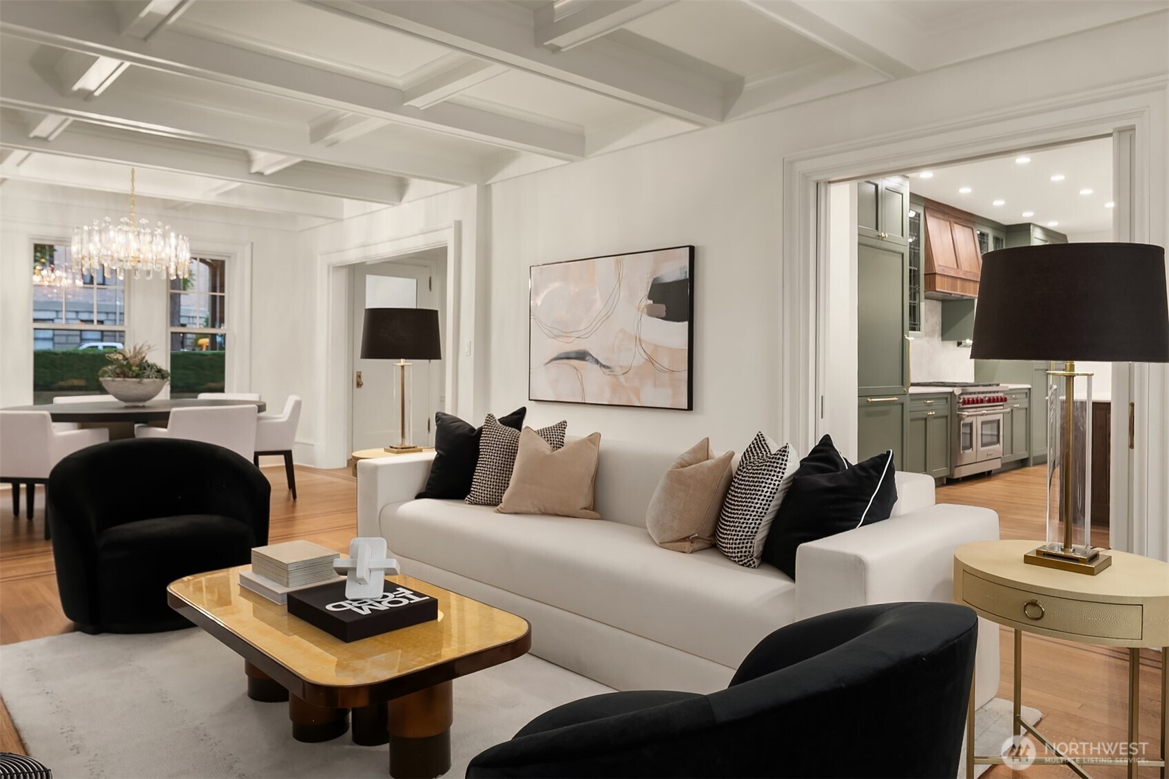 740 22nd Avenue East Seattle, WA 98112 - Photo 4 of 40 a living room with furniture a rug and a lamp