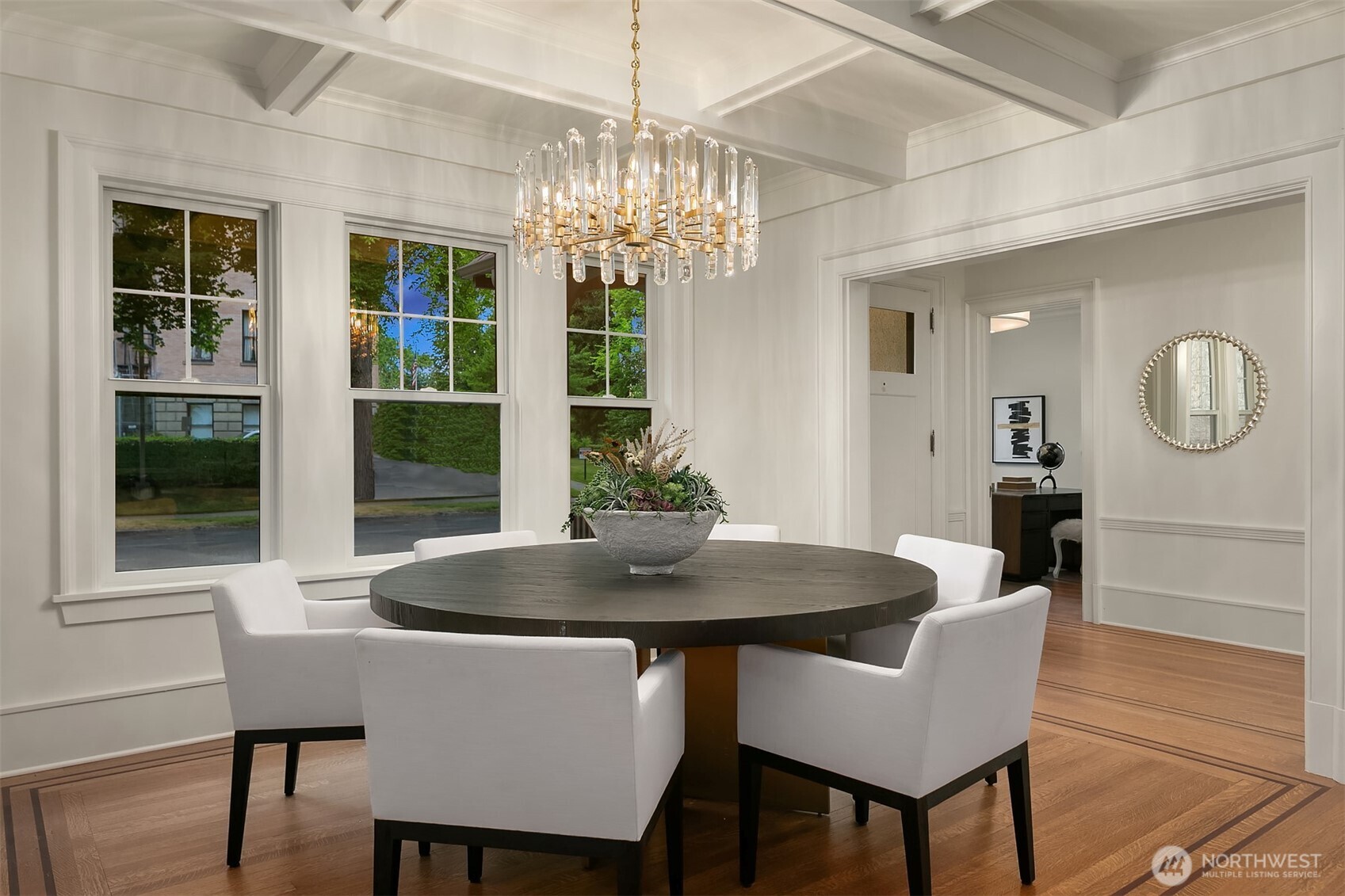740 22nd Avenue East Seattle, WA 98112 - Photo 7 of 40 a dining room with furniture a chandelier and window