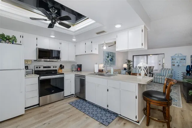 a shelf with cup and items on it