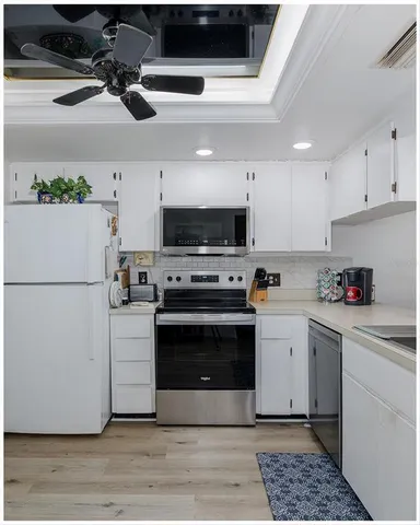 a living room with furniture and a couch