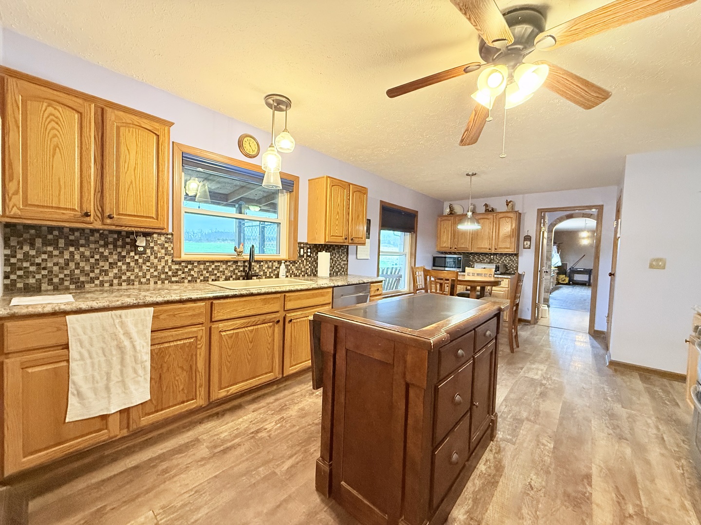 147 Hazel Road Simpson, IL 62985 - Photo 13 of 56 a kitchen with stainless steel appliances granite countertop a sink and a stove