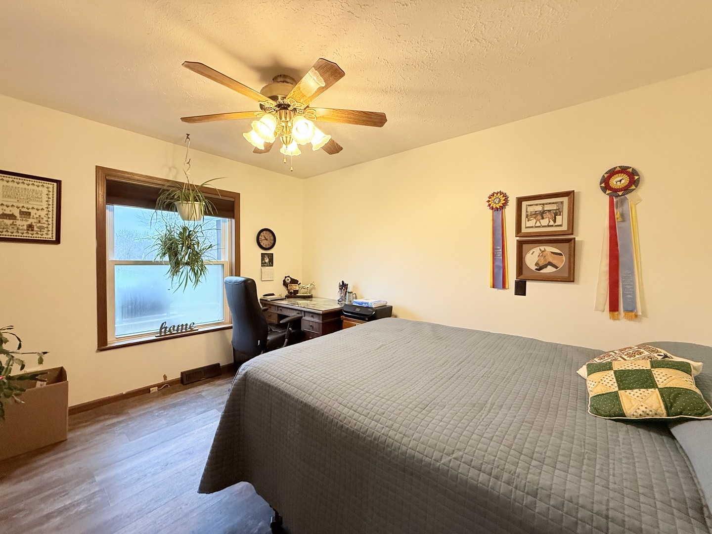 147 Hazel Road Simpson, IL 62985 - Photo 21 of 56 a bedroom with a bed and a chandelier