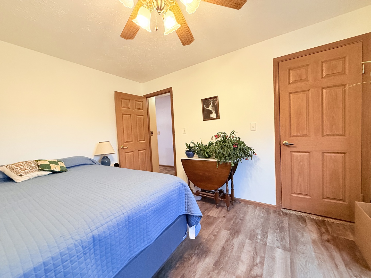 147 Hazel Road Simpson, IL 62985 - Photo 22 of 56 a bedroom with a bed and wooden floor