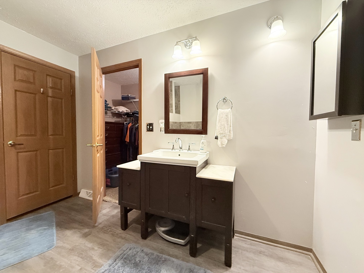 147 Hazel Road Simpson, IL 62985 - Photo 25 of 56 a bathroom with a sink a mirror and a shower