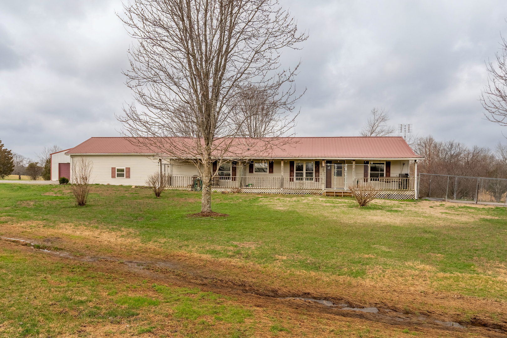 147 Hazel Road Simpson, IL 62985 - Photo 9 of 56 a front view of a house with a yard table and chairs