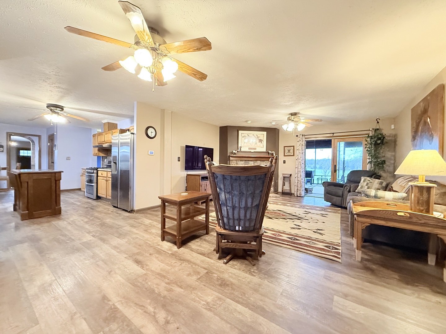 147 Hazel Road Simpson, IL 62985 - Photo 10 of 56 a living room with furniture a dining table and chairs with wooden floor