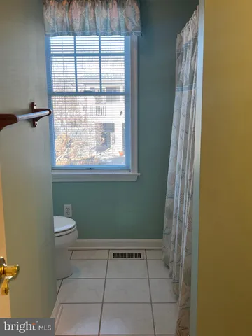 a bathroom with a toilet