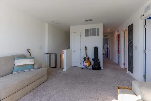 a view of a livingroom with furniture and toys