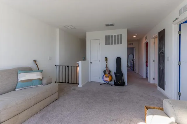 a view of a livingroom with furniture and toys