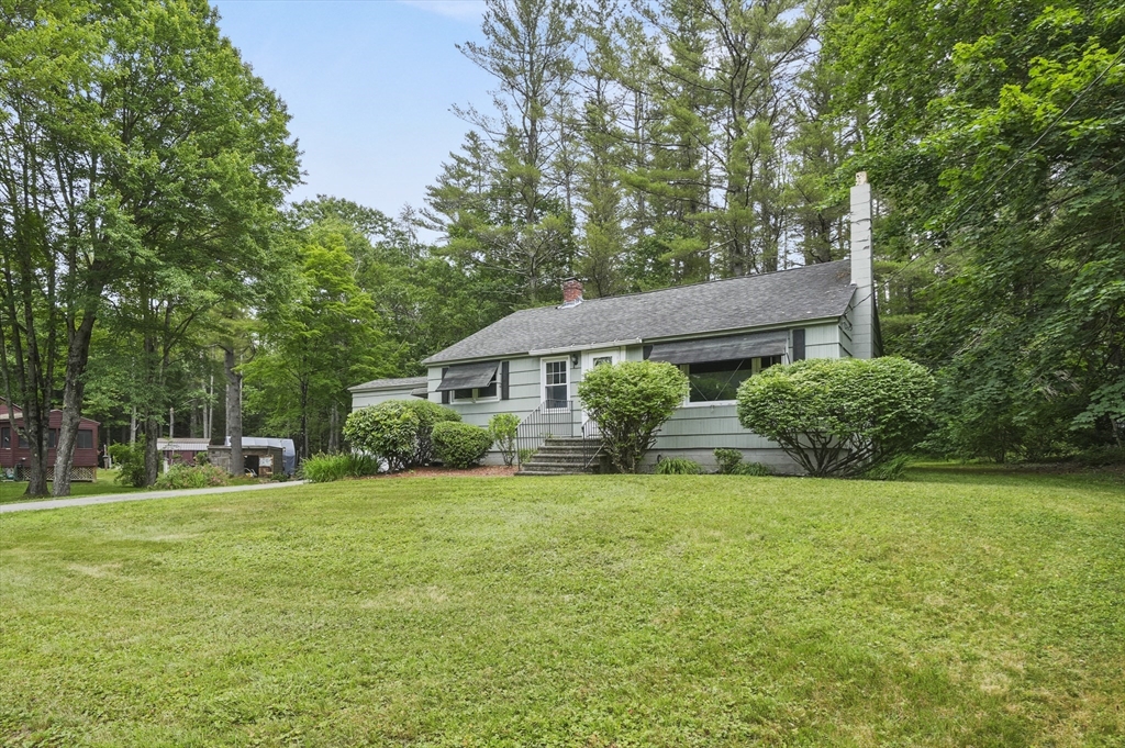 49 Winchendon Road Baldwinville, MA 01436 - Photo 2 of 33 a view of a house with a big yard and large trees