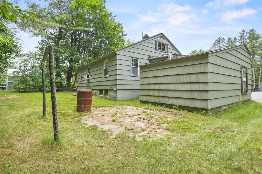 49 Winchendon Road Baldwinville, MA 01436 - Photo 27 of 33 a view of a house with backyard and sitting area