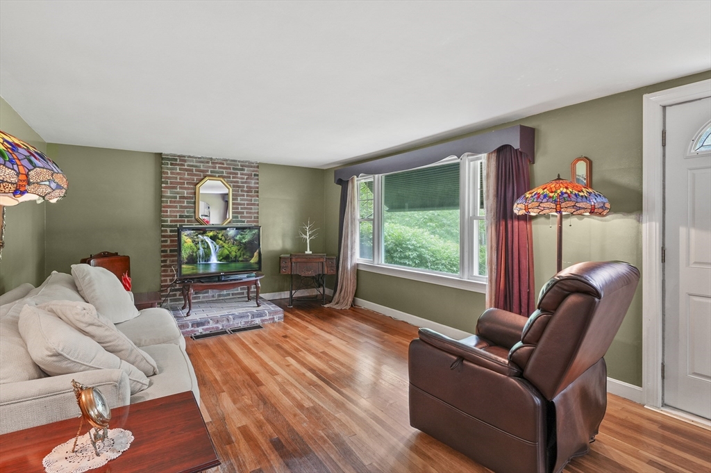 49 Winchendon Road Baldwinville, MA 01436 - Photo 6 of 33 a living room with furniture and a large window