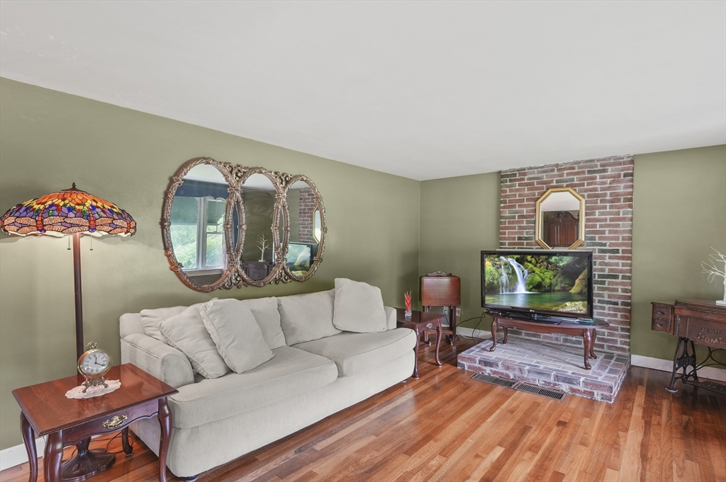 49 Winchendon Road Baldwinville, MA 01436 - Photo 7 of 33 a living room with furniture and a wooden floor