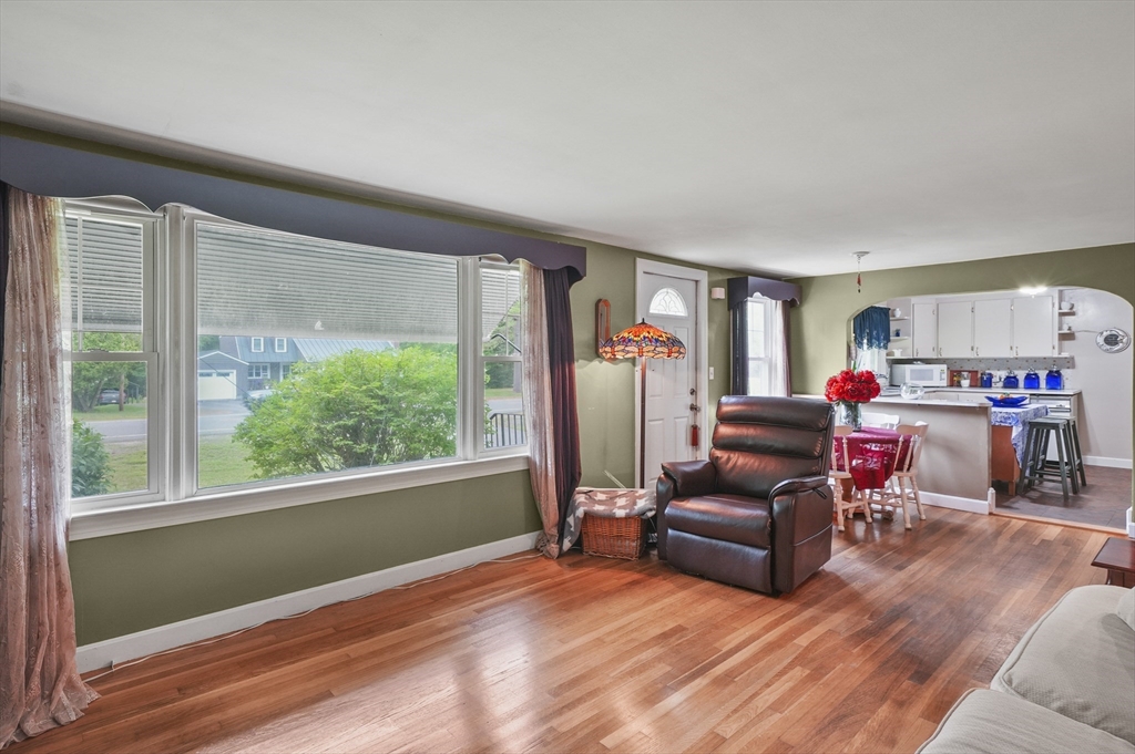 49 Winchendon Road Baldwinville, MA 01436 - Photo 8 of 33 a living room filled with furniture and a large window