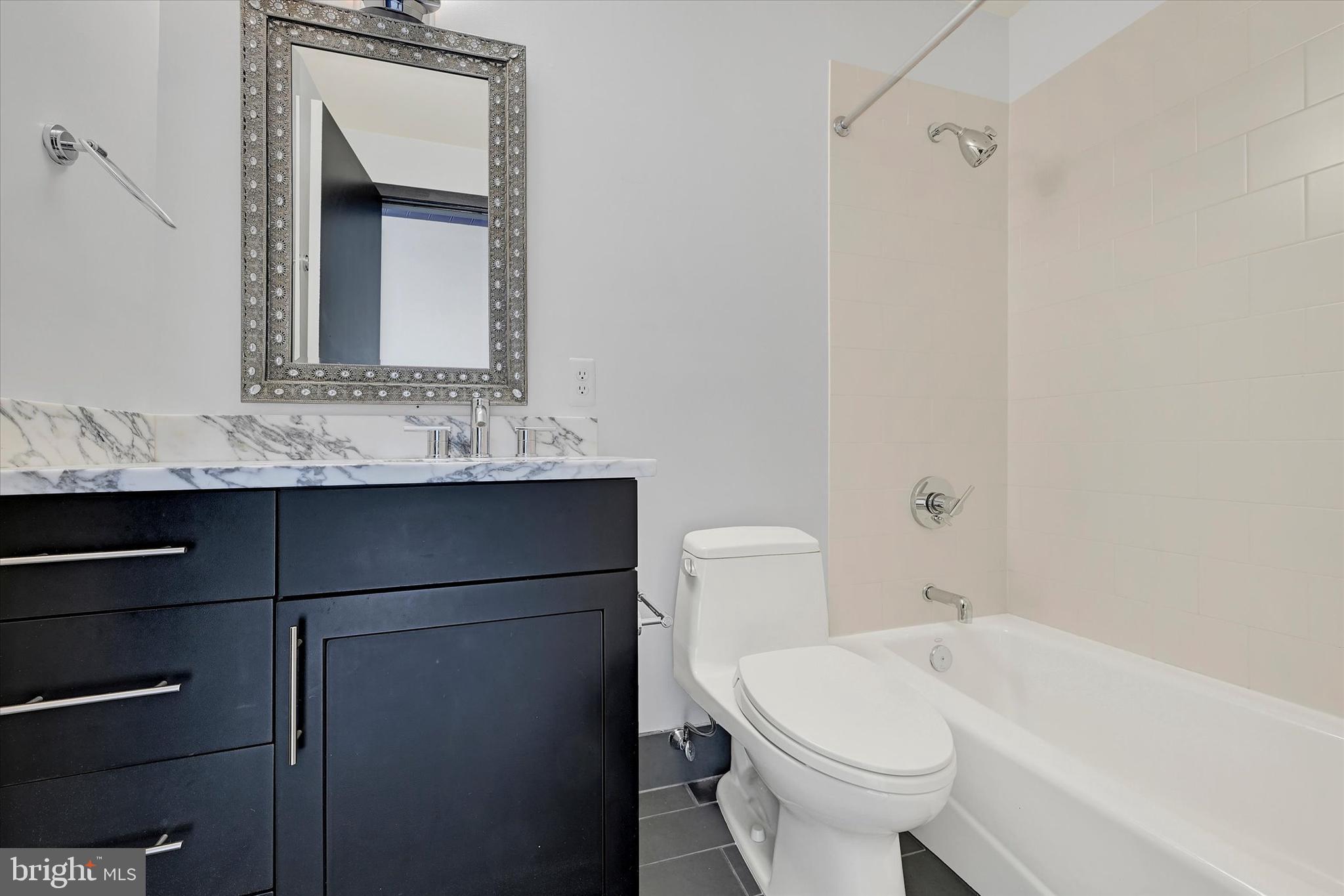 1200 Steuart Street, Unit 1913 Baltimore, MD 21230 - Photo 60 of 94 Contemporary full guest bath.