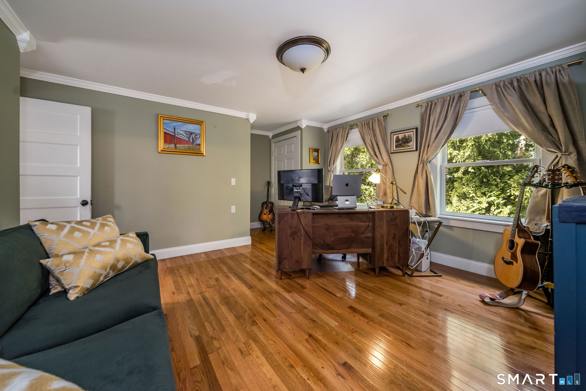 24 Cottage Place Old Saybrook, CT 06475 - Photo 21 of 38 a living room with furniture and a window