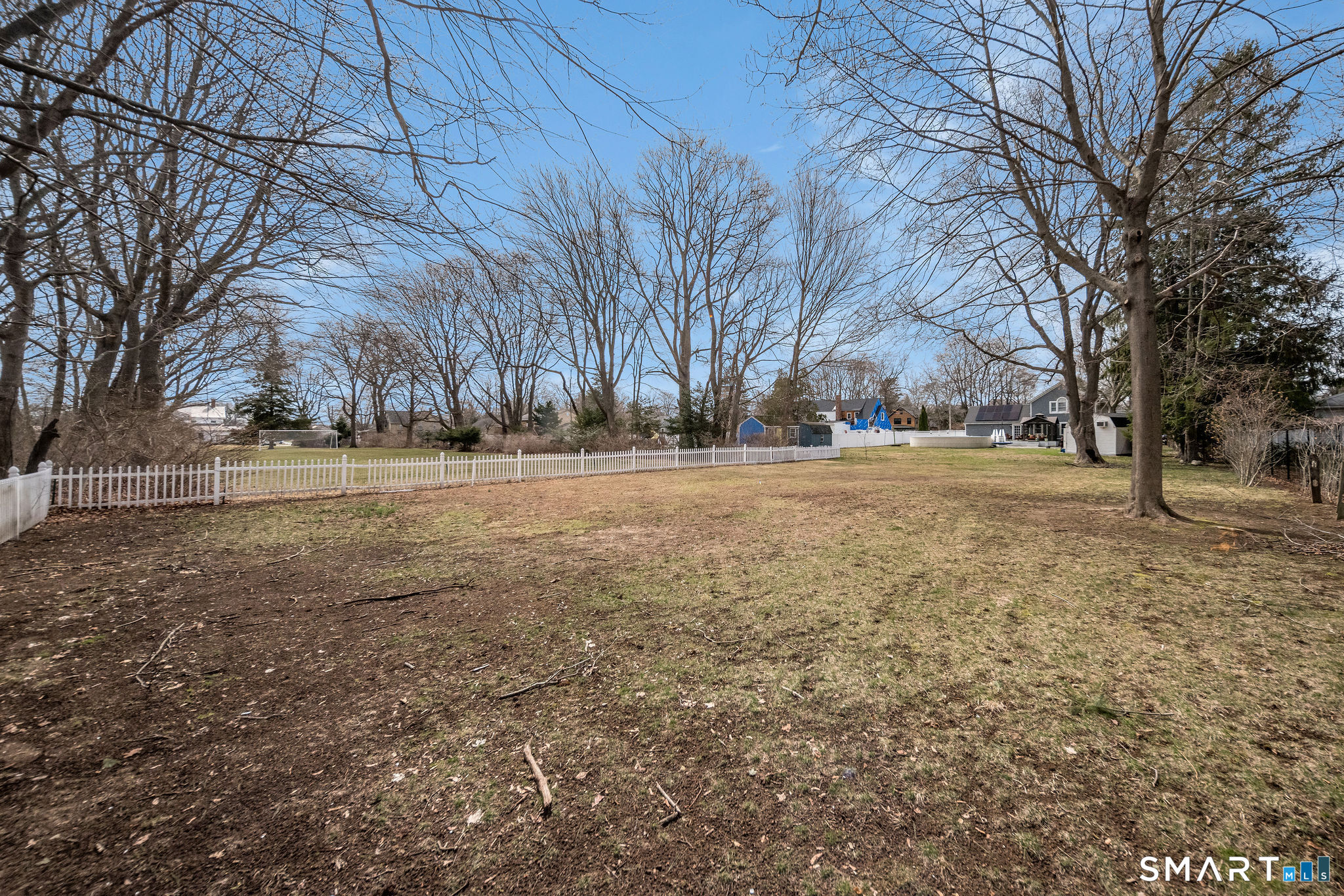 24 Cottage Place Old Saybrook, CT 06475 - Photo 27 of 38 a view of dirt yard with large trees
