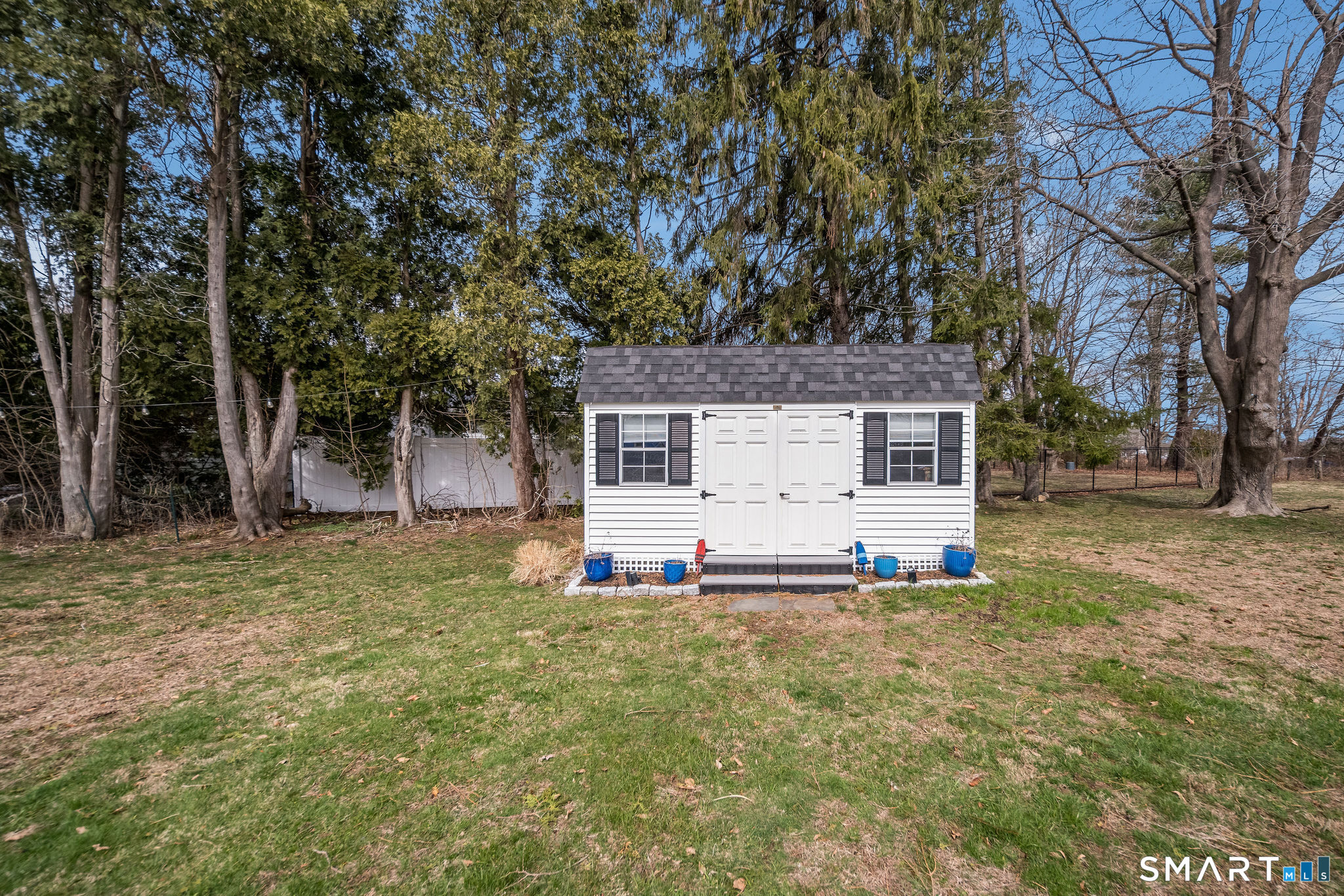 24 Cottage Place Old Saybrook, CT 06475 - Photo 29 of 38 a view of a house with a yard and tree