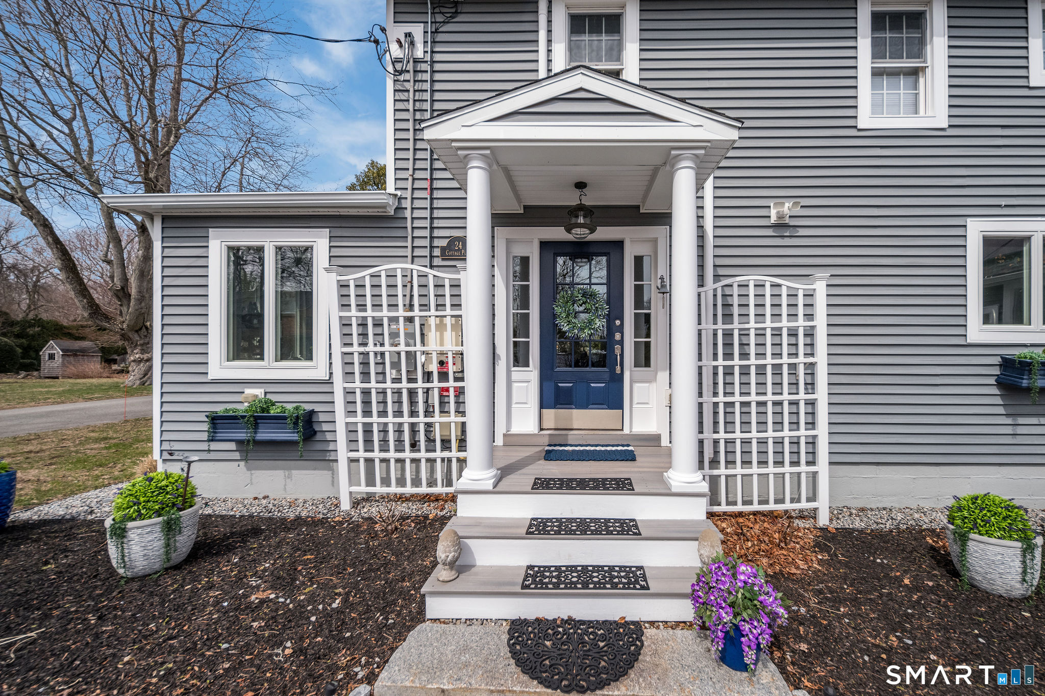 24 Cottage Place Old Saybrook, CT 06475 - Photo 4 of 38 a front view of a house