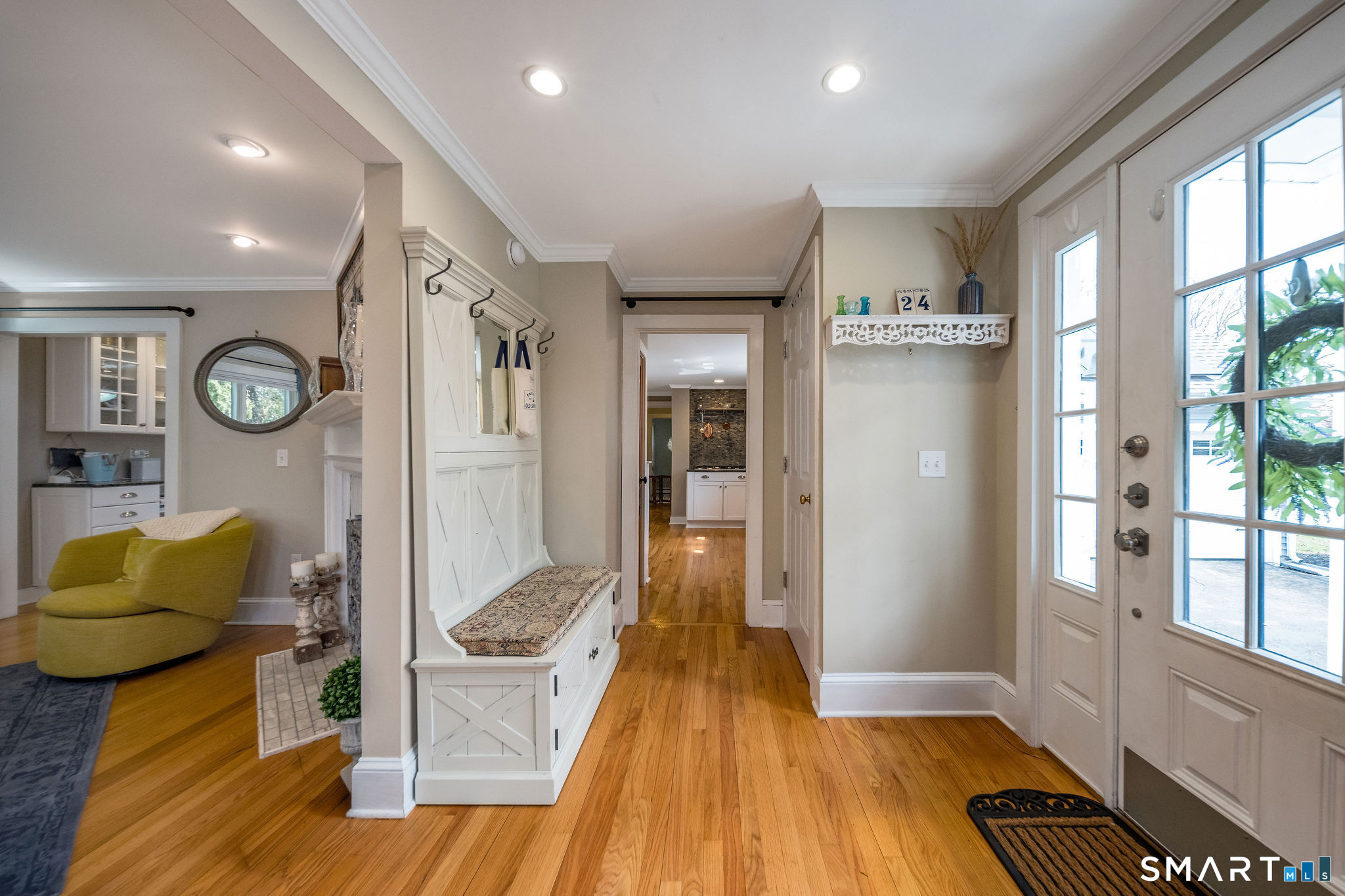 24 Cottage Place Old Saybrook, CT 06475 - Photo 5 of 38 a view of hallway with furniture and a rug