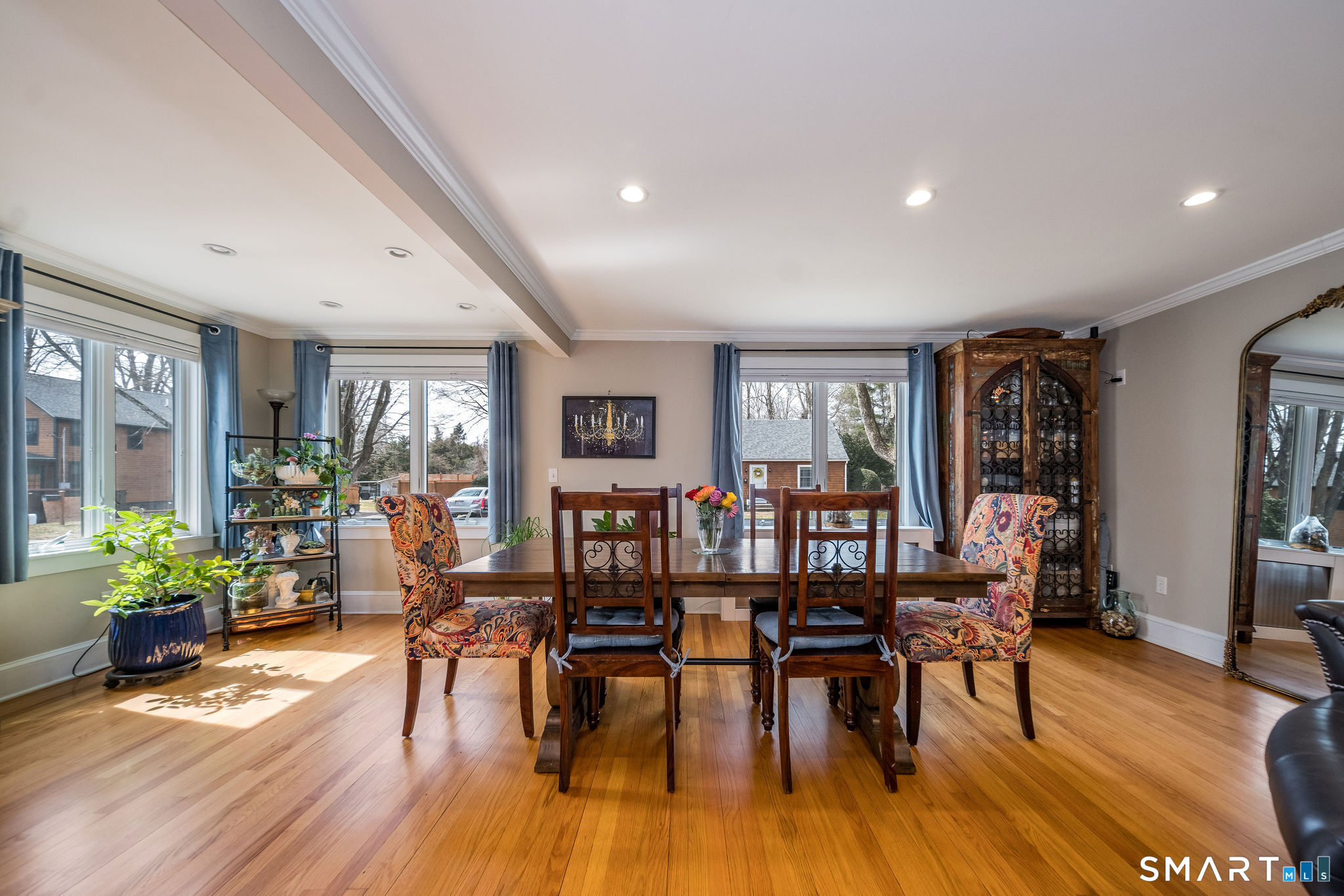 24 Cottage Place Old Saybrook, CT 06475 - Photo 7 of 38 a view of a a dining room with furniture window and wooden floor