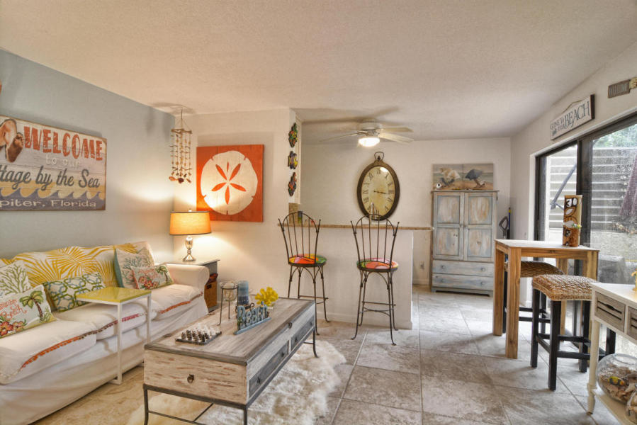 1605 Highway 1, Unit 4D Jupiter, FL 33477 - Photo 2 of 12 Living Room and Kitchen view