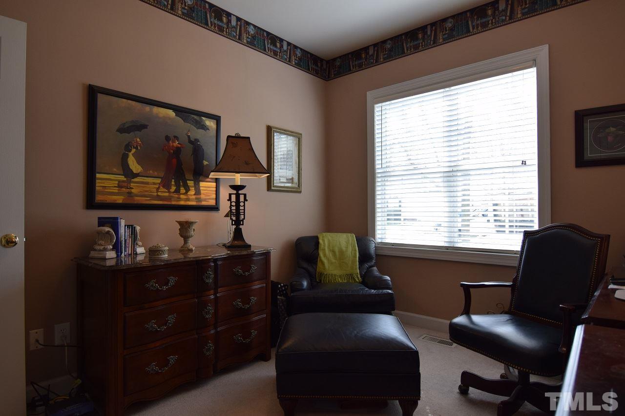 6404 Nowell Pointe Drive Raleigh, NC 27607 - Photo 18 of 24 a livingroom with workspace and a window