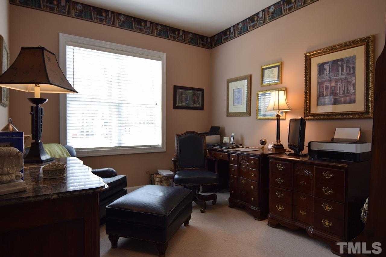 6404 Nowell Pointe Drive Raleigh, NC 27607 - Photo 19 of 24 a view of a workspace with a window
