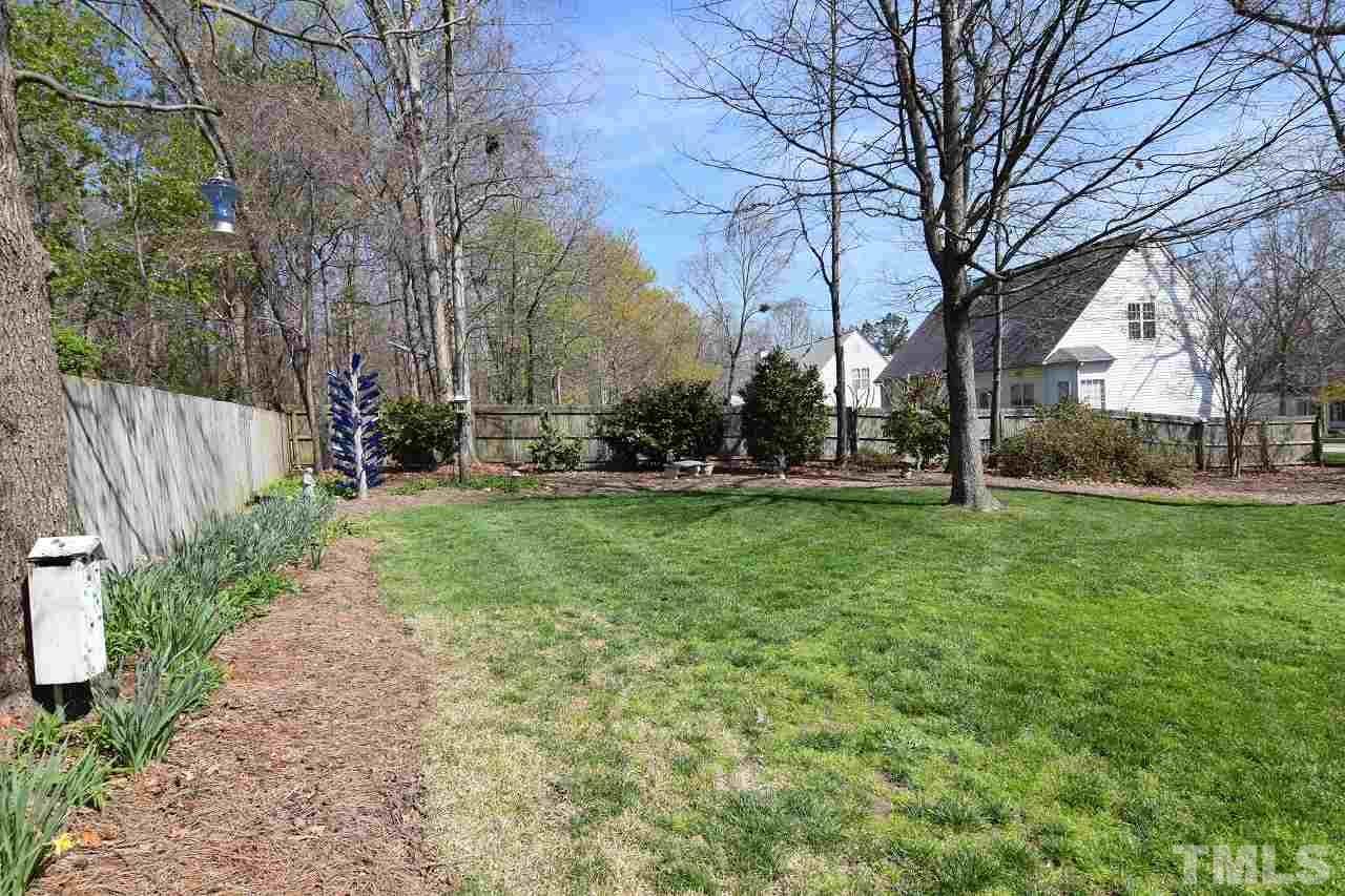 6404 Nowell Pointe Drive Raleigh, NC 27607 - Photo 23 of 24 a view of a park that has large trees