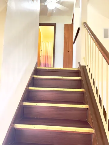 a view of wooden balcony with wooden floor