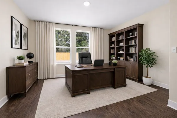 a living room with furniture window and potted plants