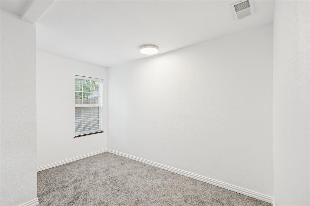 3000 Burchill Road South Fort Worth, TX 76105 - Photo 17 of 26 an empty room with windows