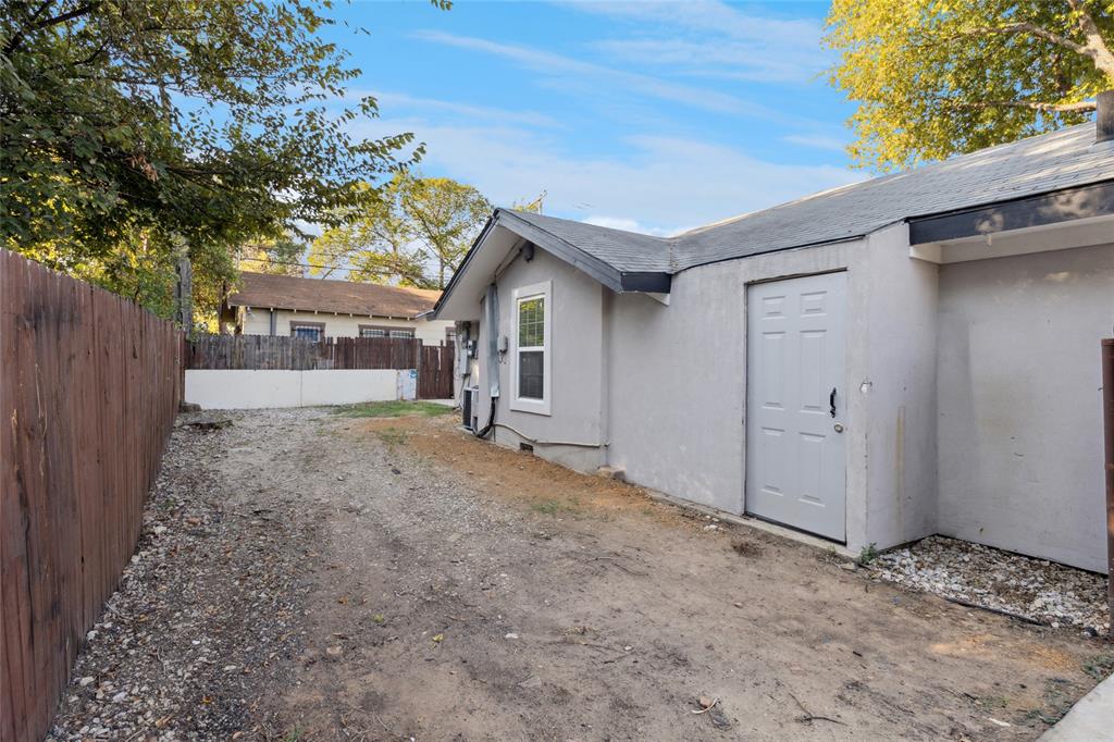 3000 Burchill Road South Fort Worth, TX 76105 - Photo 26 of 26 a view of a house with a yard and garage