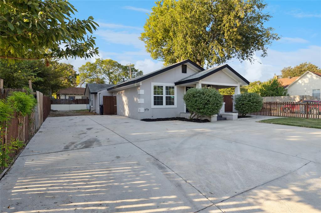 3000 Burchill Road South Fort Worth, TX 76105 - Photo 3 of 26 a view of a house with a garden