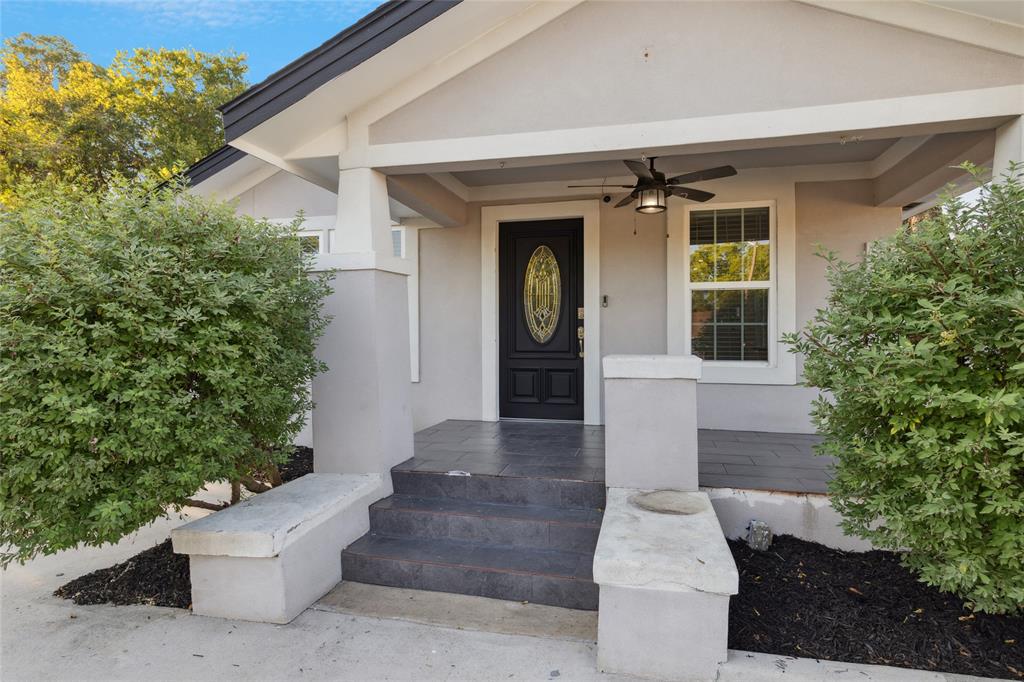 3000 Burchill Road South Fort Worth, TX 76105 - Photo 4 of 26 a front view of a house with a yard