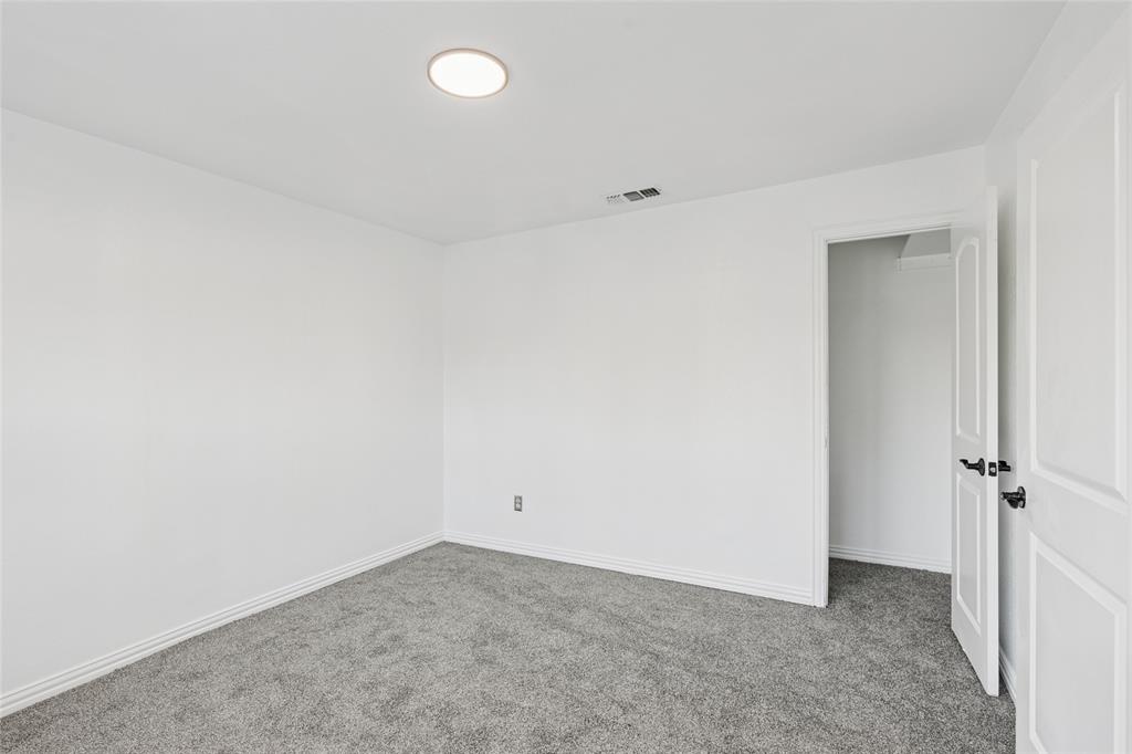 3000 Burchill Road South Fort Worth, TX 76105 - Photo 9 of 26 an empty room with a workbench