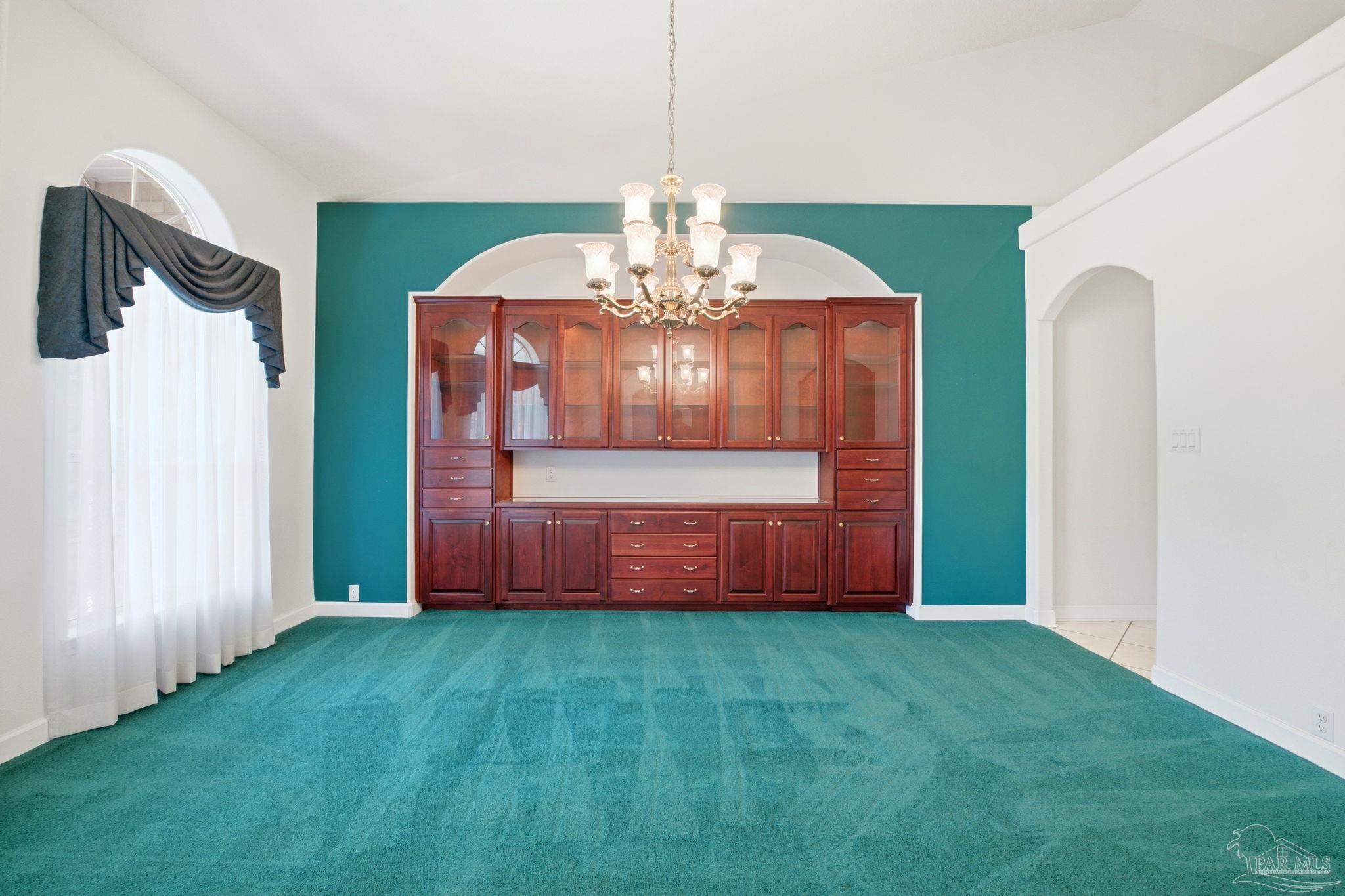 4552 Peaden Road Pace, FL 32571 - Photo 8 of 38 a view of an entryway with a fireplace
