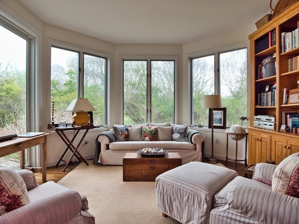 14 Eagle Drive Dartmouth, MA 02748 - Photo 11 of 20 a living room with furniture and two large windows