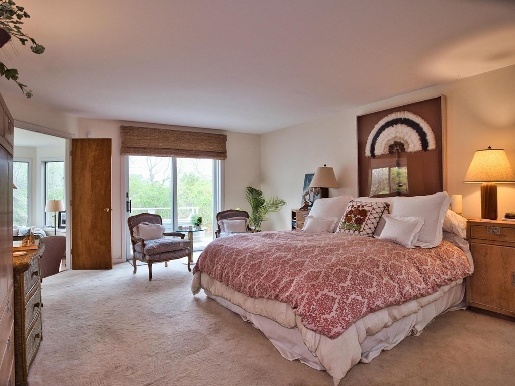 14 Eagle Drive Dartmouth, MA 02748 - Photo 12 of 20 a bedroom with a bed and a large window