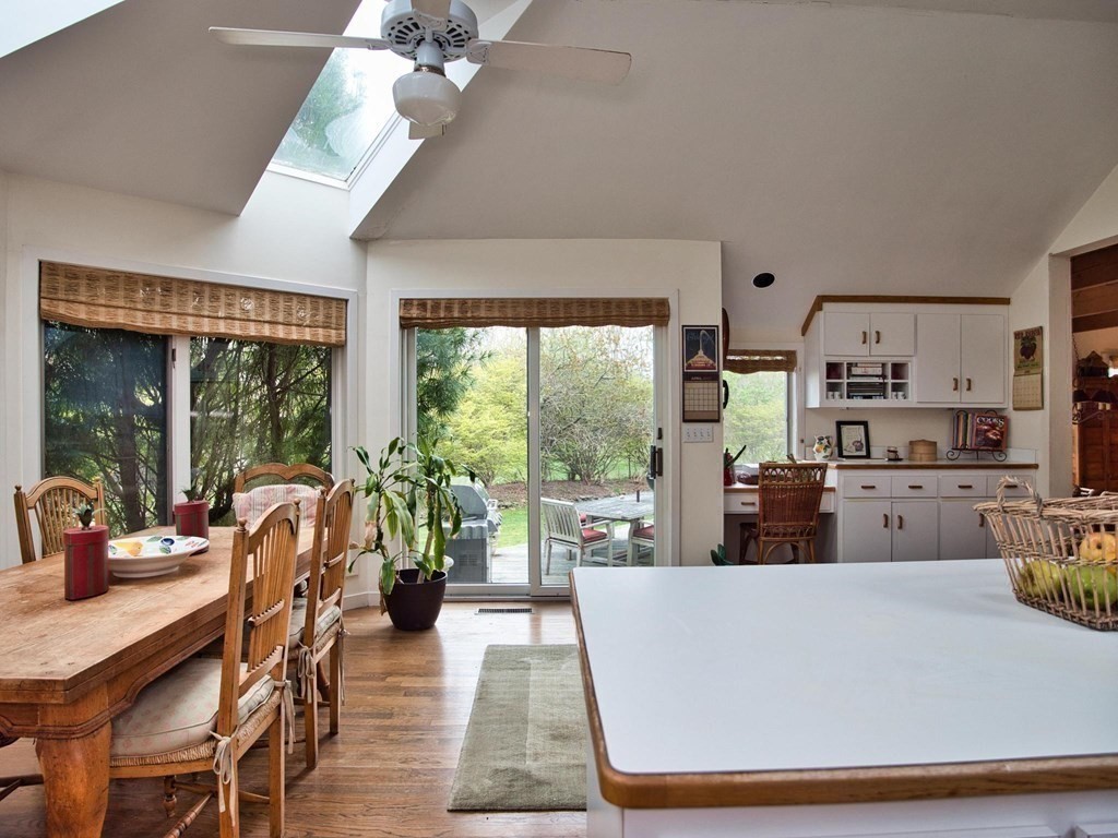 14 Eagle Drive Dartmouth, MA 02748 - Photo 6 of 20 a living room with furniture a large window and dining table