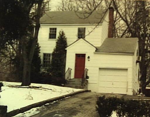 118 Knox Road Stamford, CT 06907 - Photo 1 of 1 a front view of a house with a yard