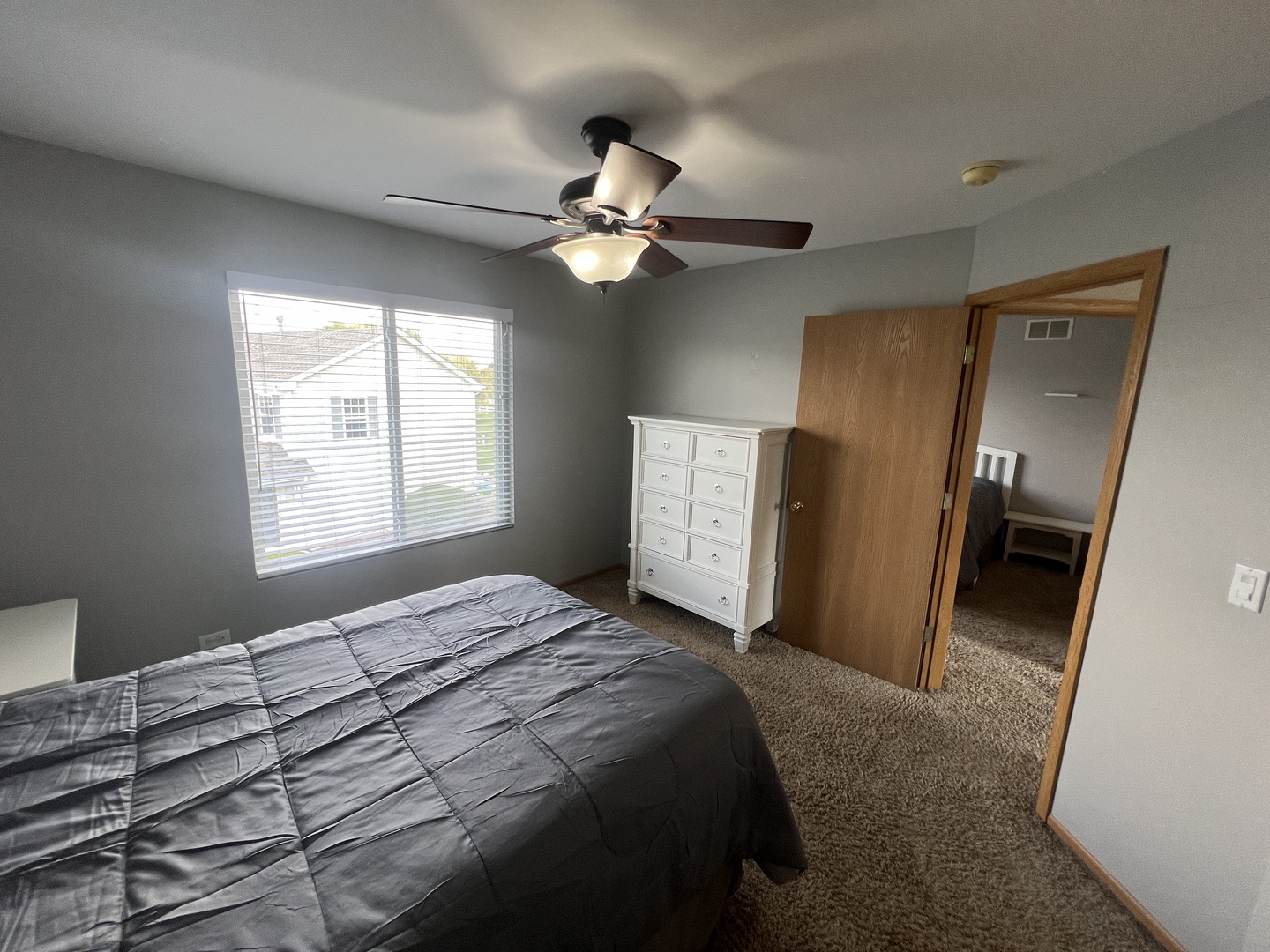 507 Prairie View Drive Minooka, IL 60447 - Photo 10 of 18 a bedroom with a bed and a window