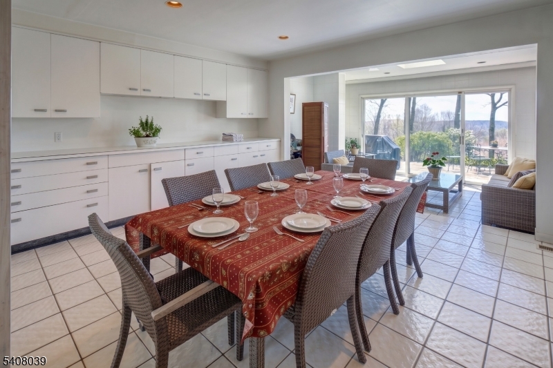 235 Mountainside Road Mendham, NJ 07945 - Photo 15 of 47 a view of a dining room with furniture window and outside view