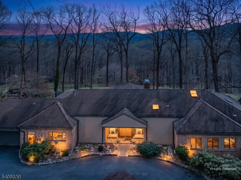 235 Mountainside Road Mendham, NJ 07945 - Photo 2 of 47 a backyard of a house with lots of green space