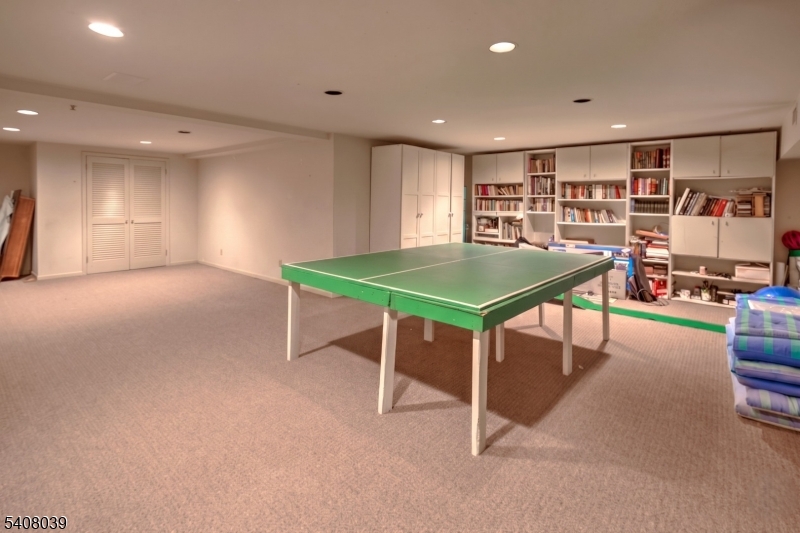 235 Mountainside Road Mendham, NJ 07945 - Photo 31 of 47 a room with furniture and a table