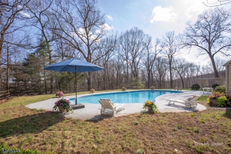 235 Mountainside Road Mendham, NJ 07945 - Photo 42 of 47 a view of backyard with wooden fence