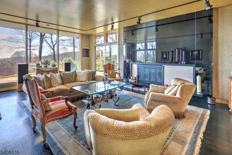 235 Mountainside Road Mendham, NJ 07945 - Photo 9 of 47 a outdoor living space with furniture and a large window